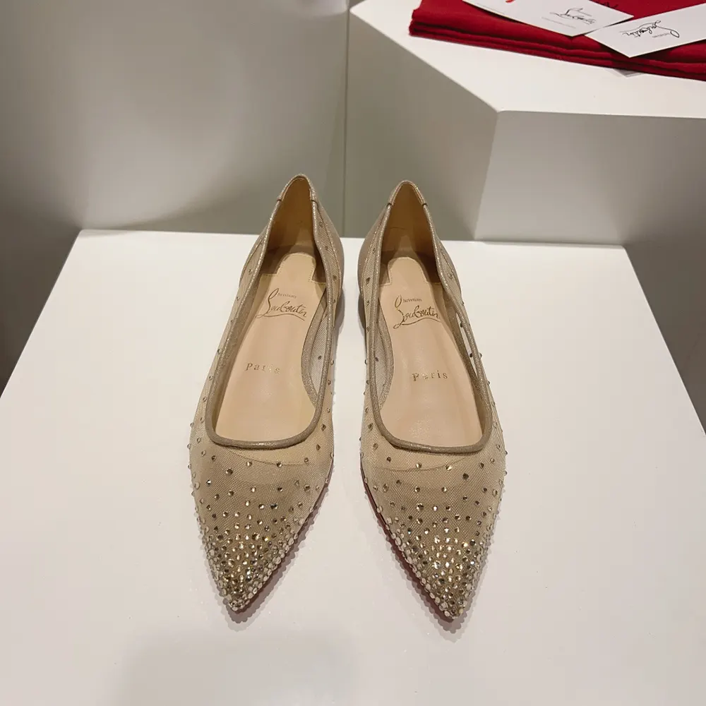 Close-up of crystal strass detail on Christian Louboutin Women Follies Strass Ballerinas