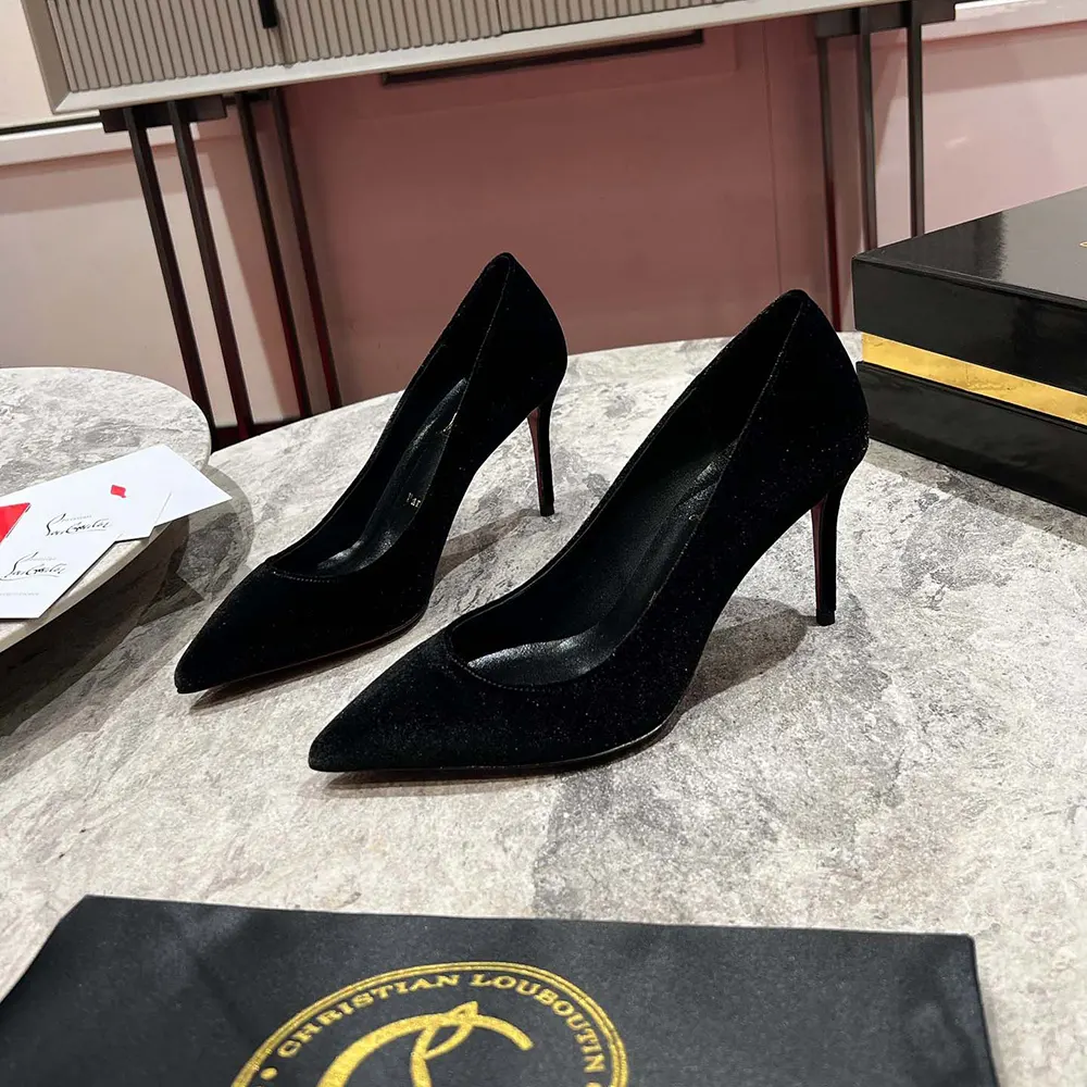 Elegant front view showcasing pointed toe of Christian Louboutin Kate pumps