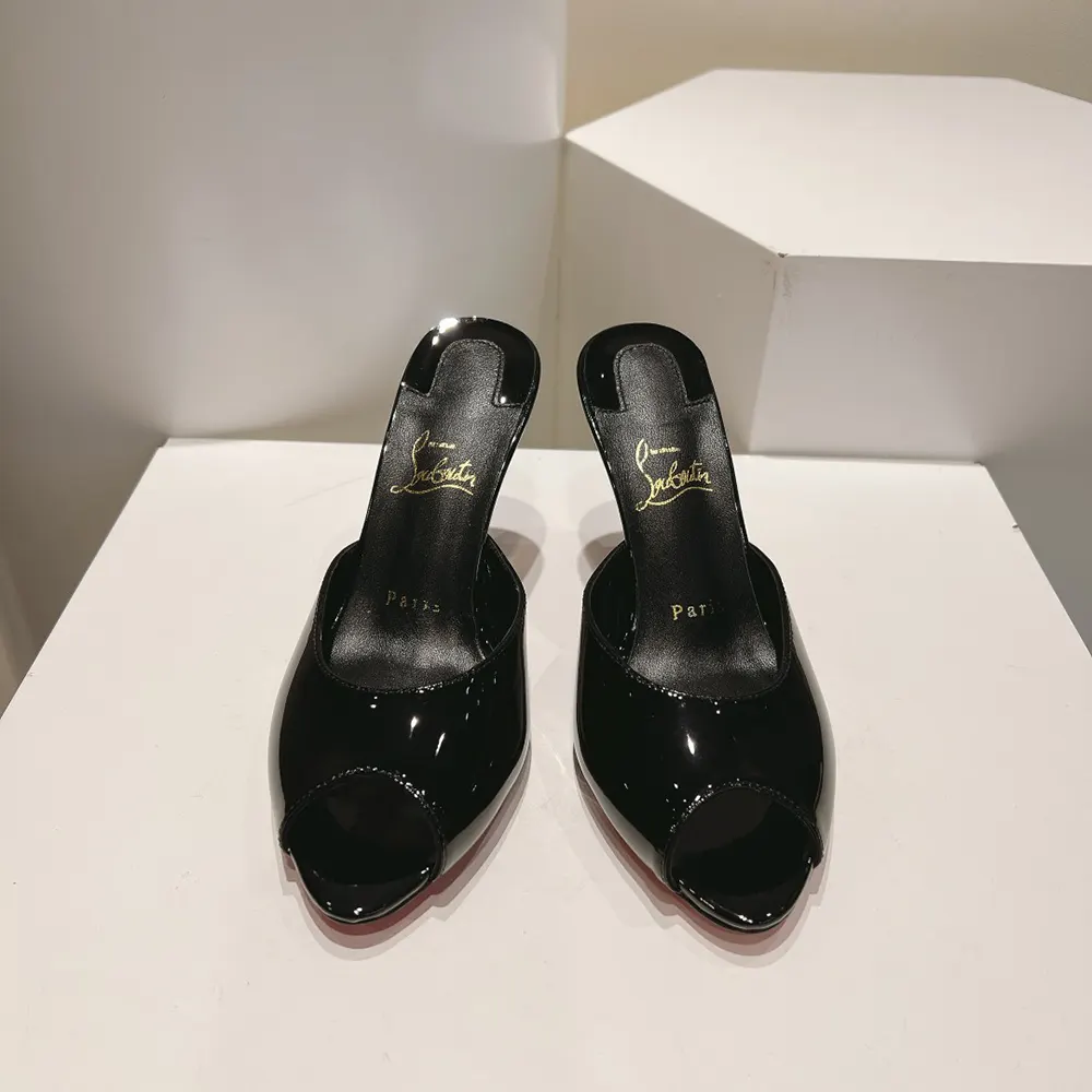Close-up of signature red sole on Me Dolly 100 mm mules