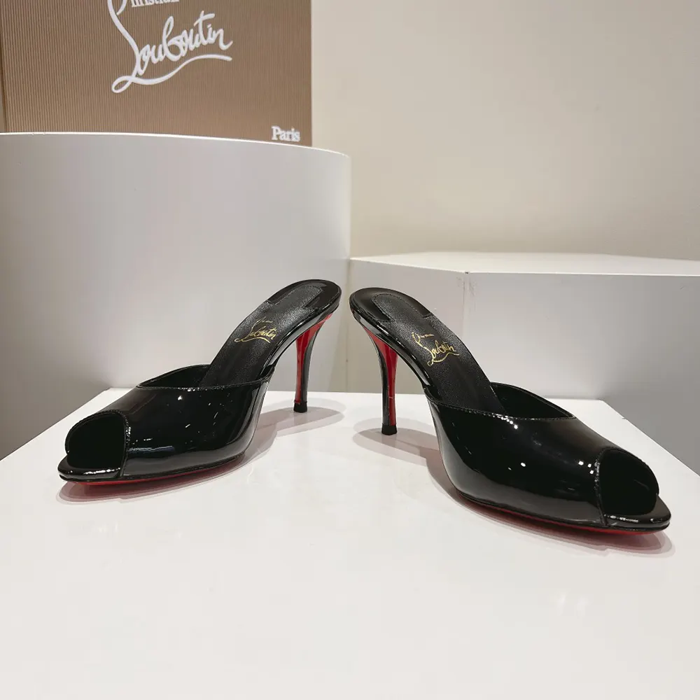 Top view showing glossy patent calfskin and spiked heel detail