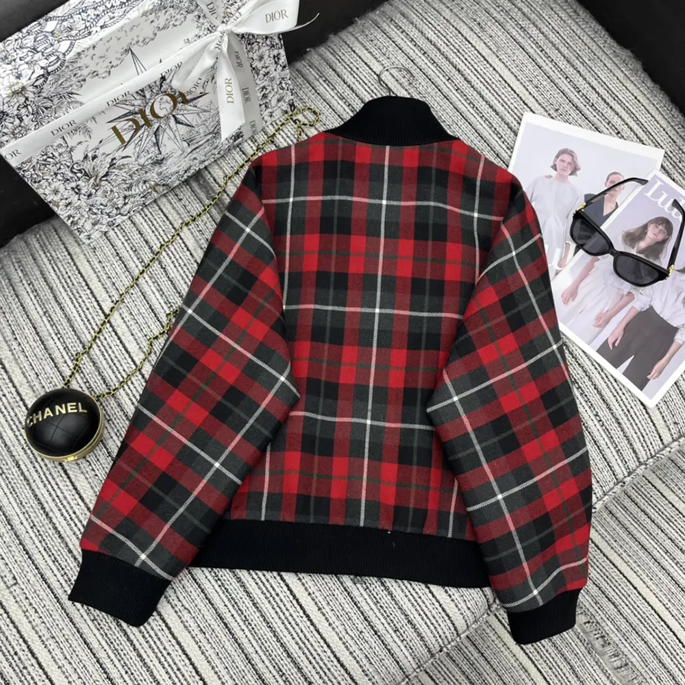 Side profile showing fit and silhouette of Dior Women Cannage Bomber Jacket with Vest