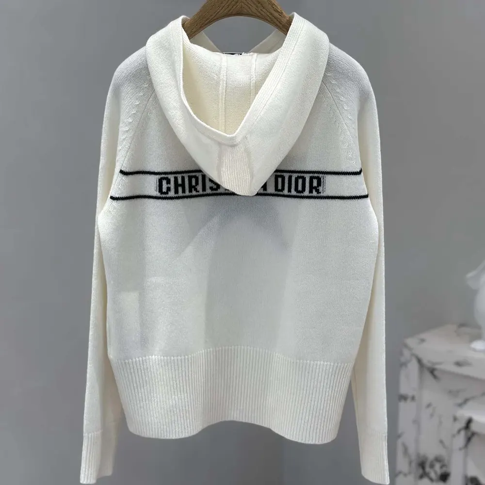 Side profile of Dior Women DiorAlps Hooded Sweater showing relaxed silhouette