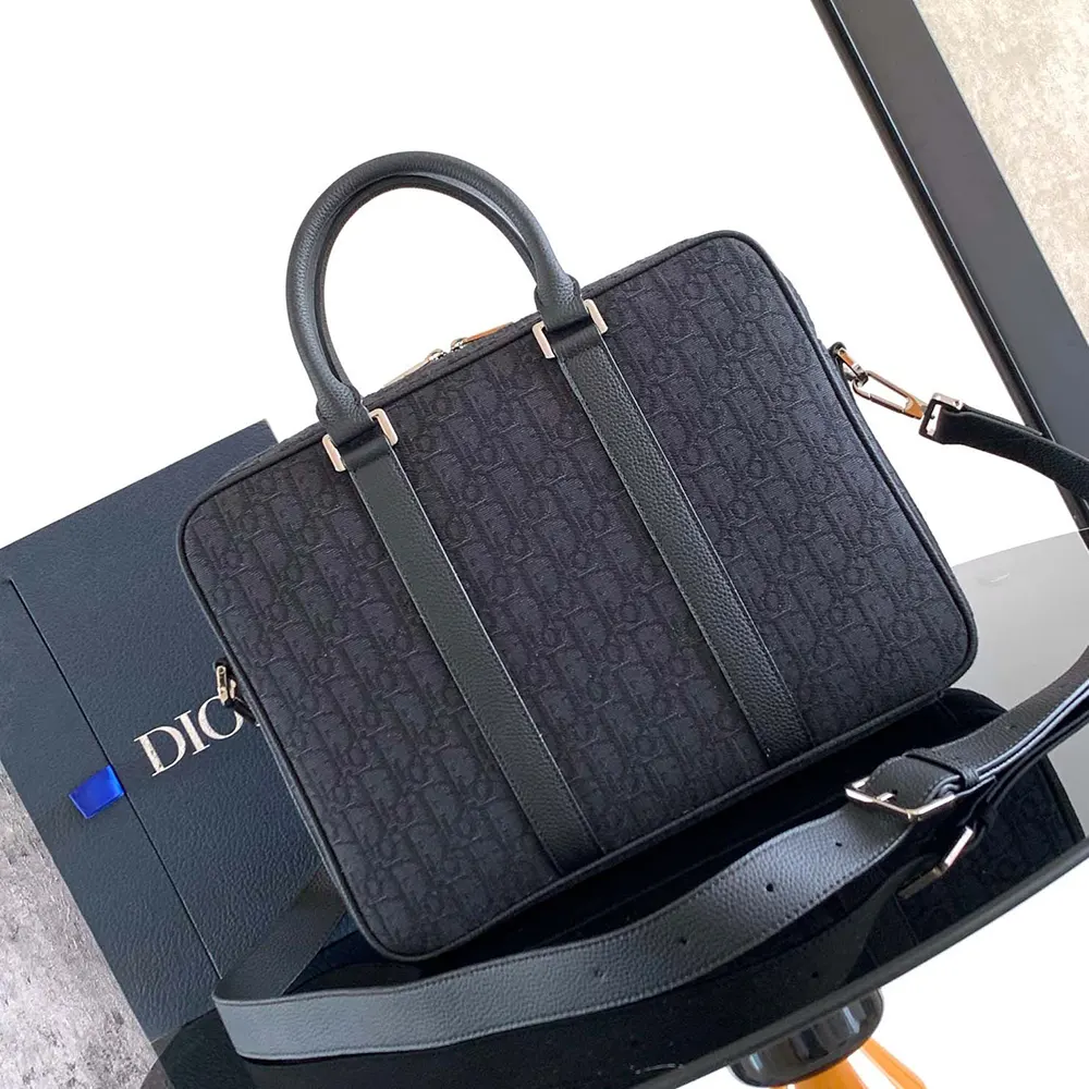 Side angle showing slim profile of Dior Men Zipped Briefcase