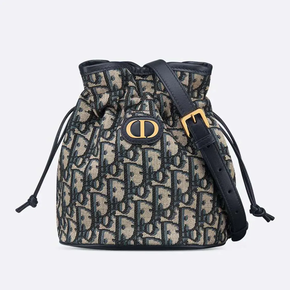 Front view of Dior Women 30 Montaigne Mini Bucket Bag with navy leather
