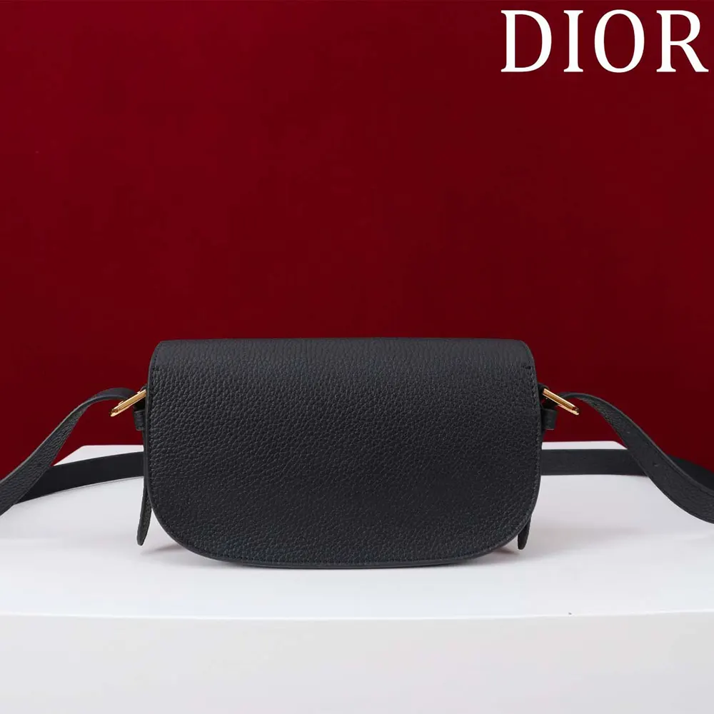 Side profile showing textured black grained calfskin of Dior Women Bobby Bag