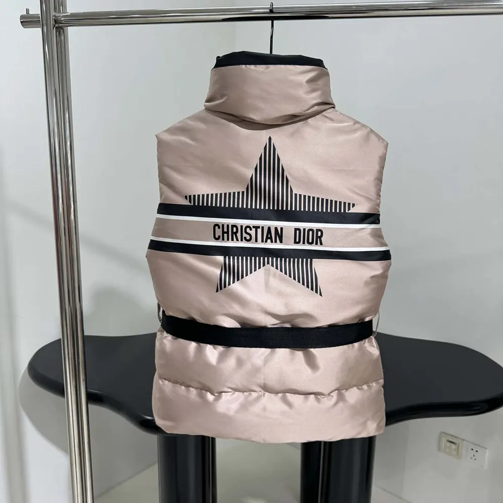 Side angle showing silhouette and metal hardware on Dior Women DiorAlps Belted Vest