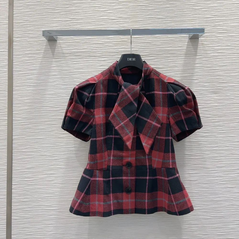 Side angle showcasing silhouette of Dior Women Fitted Short-Sleeved Jacket
