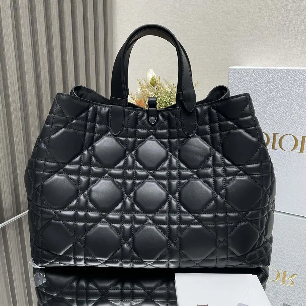 Side angle showing silhouette and adjustable strap of Dior bag