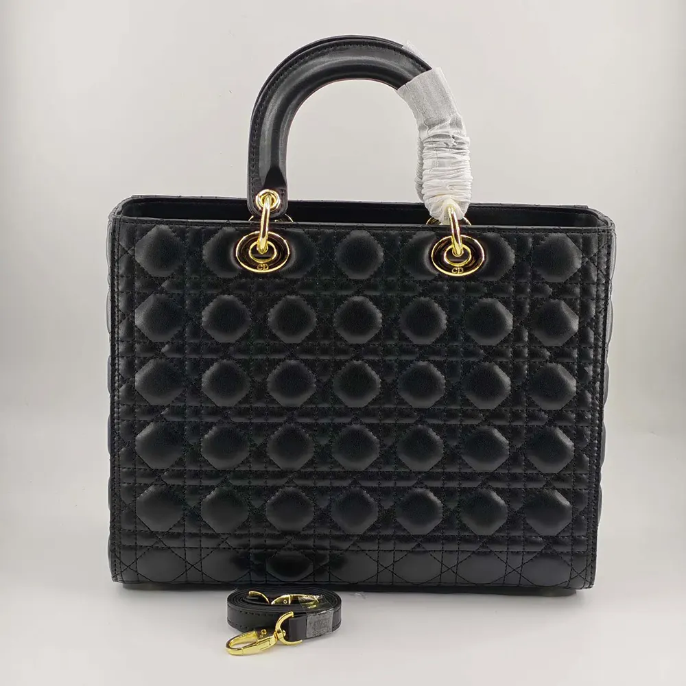 Side view showing silver hardware on Dior Women Large Lady Dior Bag