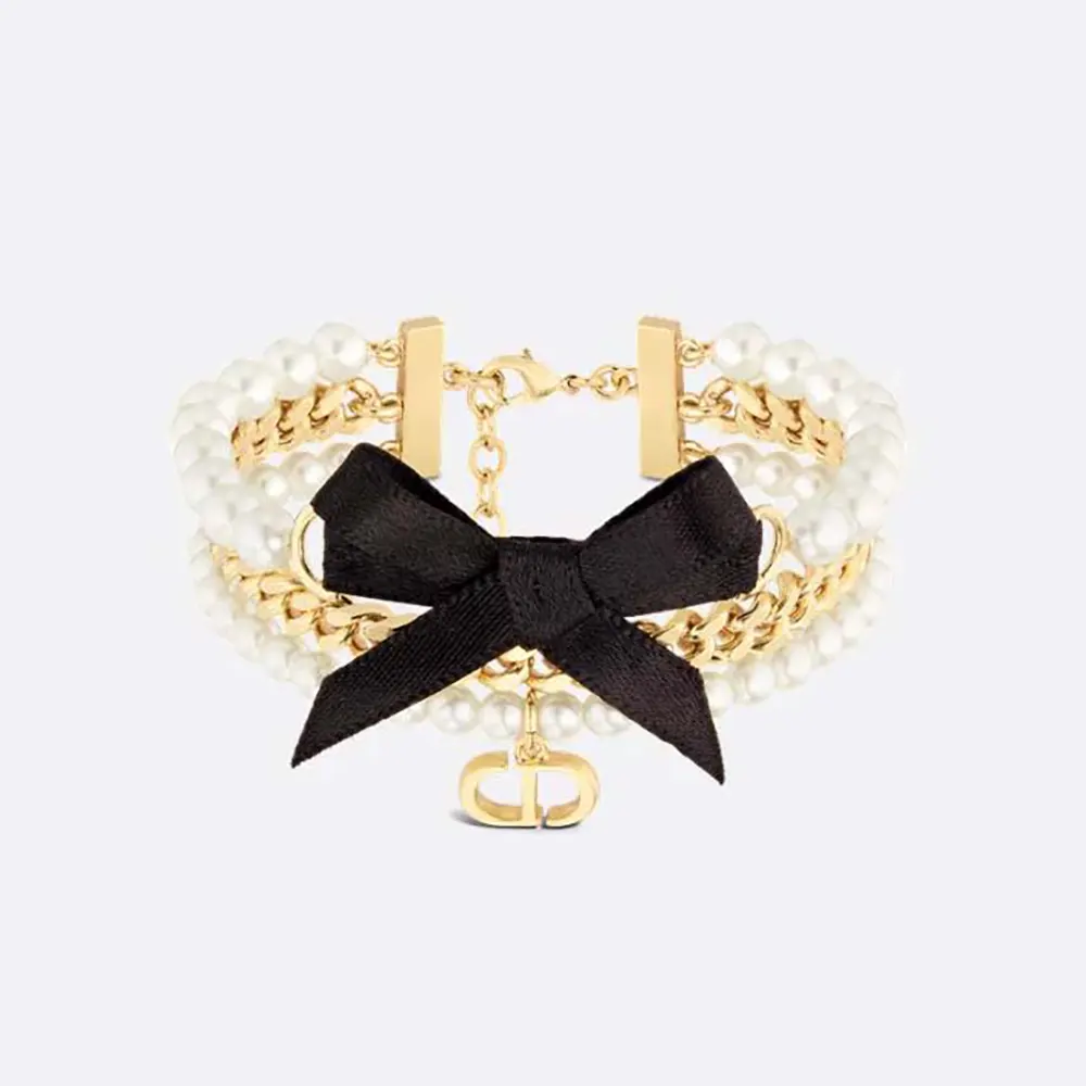 Close-up of Dior Women Le Nœud de Dior Bracelet showing pearls and satin bow
