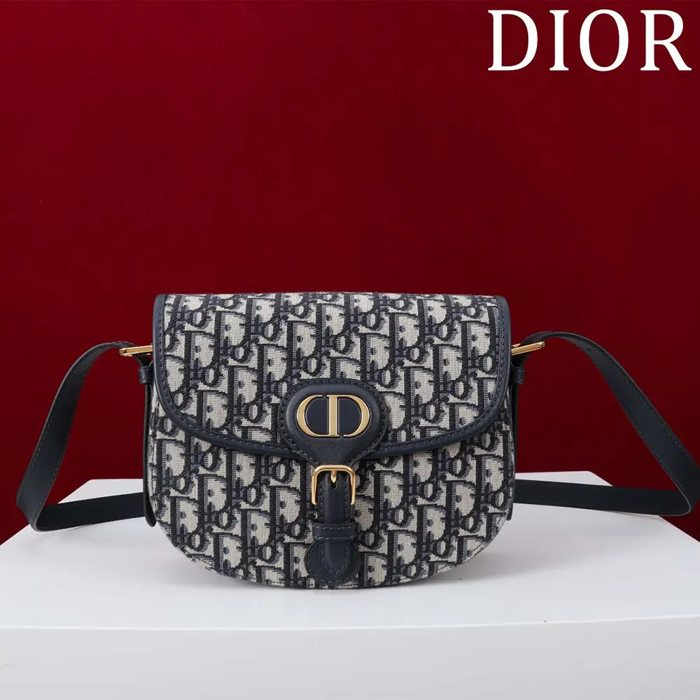 Close-up of silver-tone CD hardware on Dior Women Medium Dior Bobby Bag