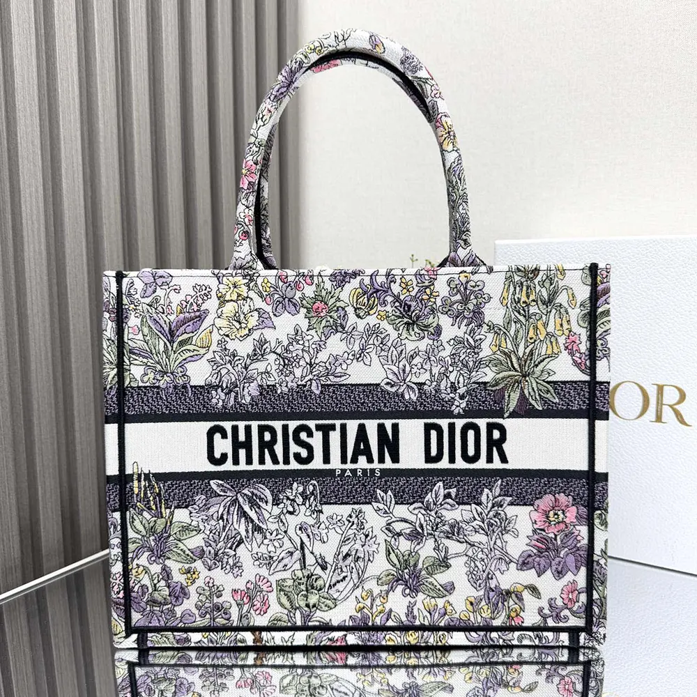 Close-up of multicolor Millefiori unicorn motif on Dior tote