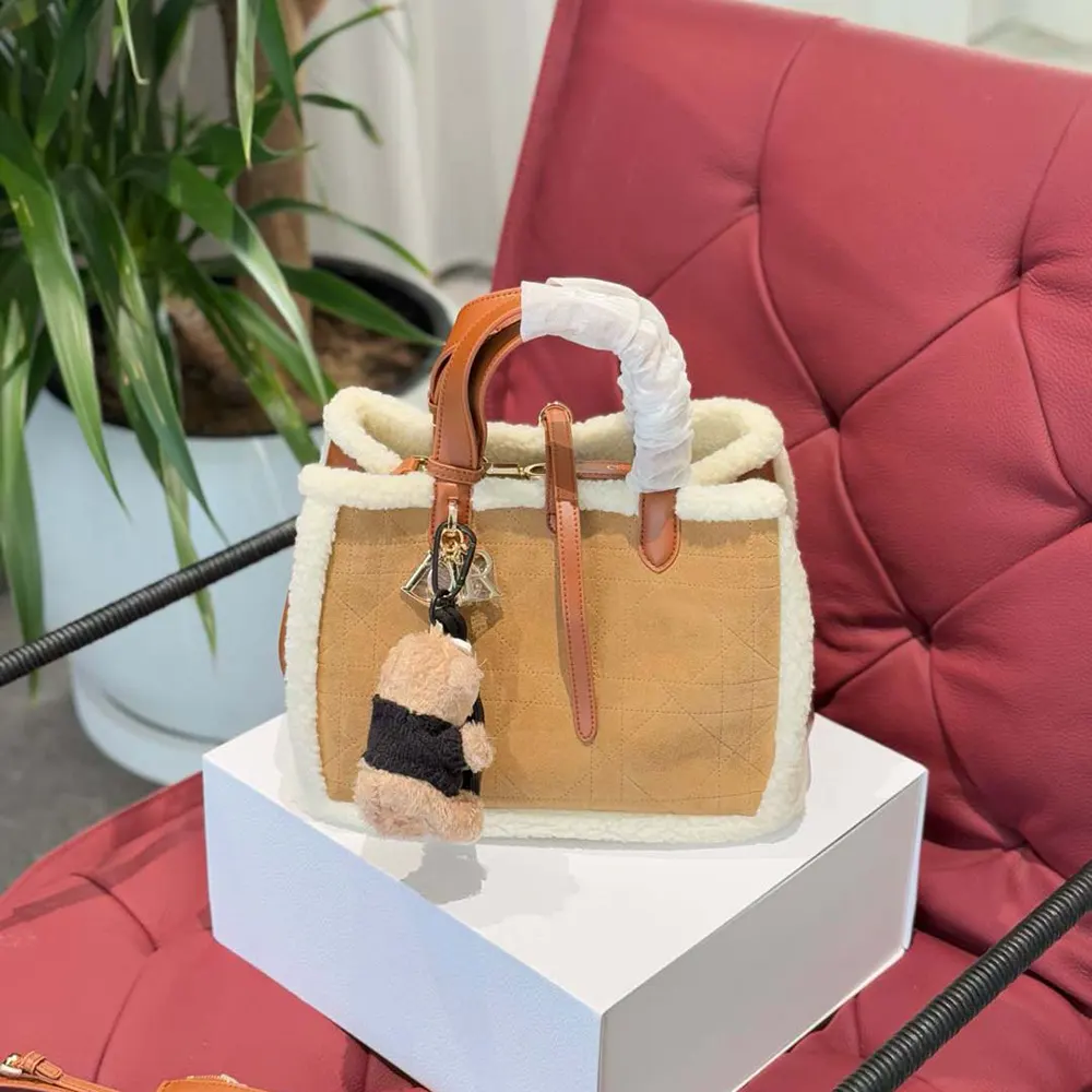 Side profile highlighting gold hardware on Dior Women Medium Dior Toujours Bag