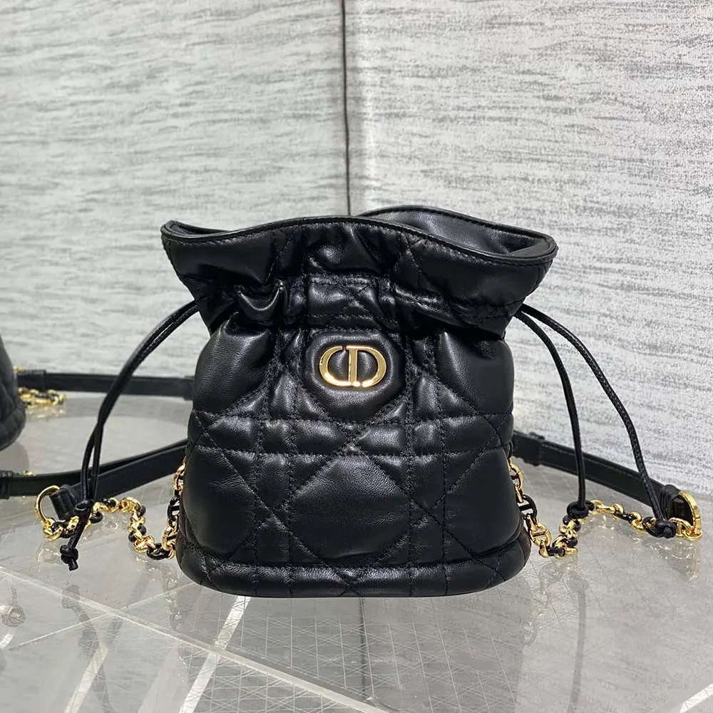 Close-up of black macrocannage lambskin and drawstring closure detail