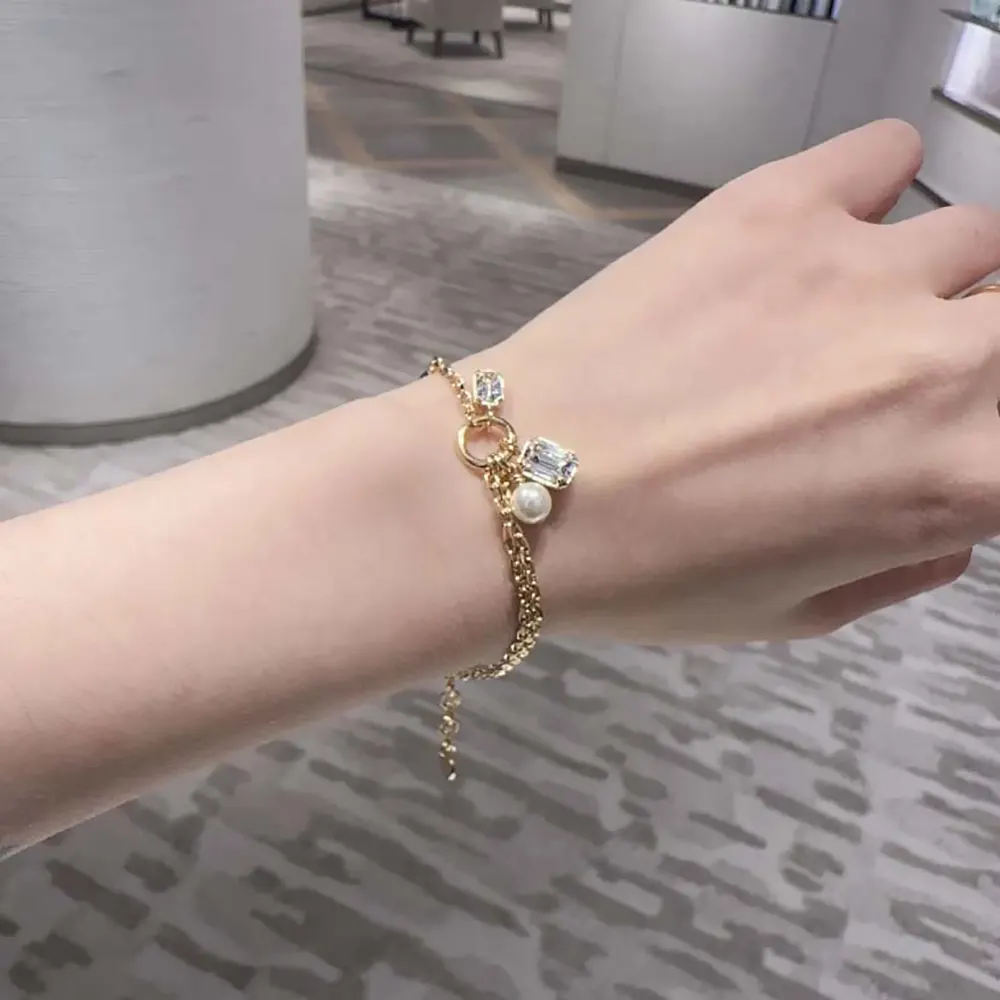 Dior Women Petit CD Bracelet Gold-Finish Metal with a White Resin Pearl and Silver-Tone Crystals - image 9