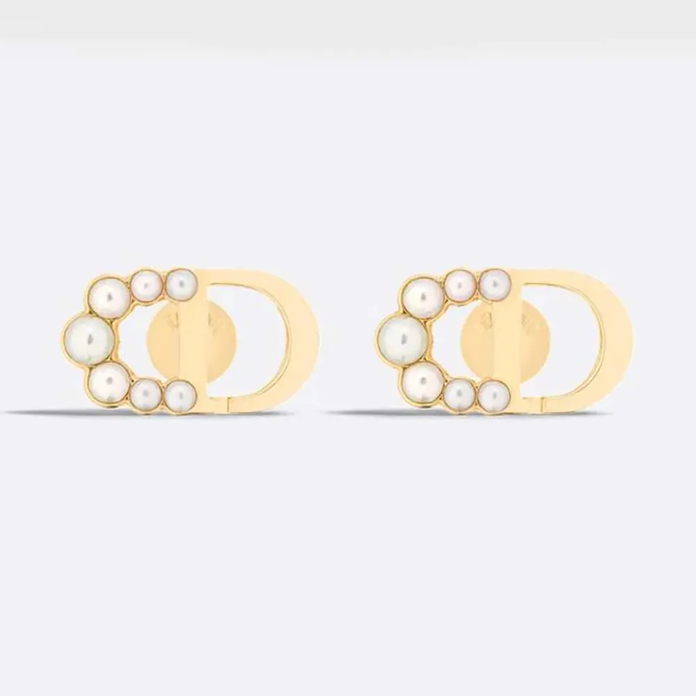 Close-up of Dior Women Petit CD Mini Stud Earrings gold finish detail