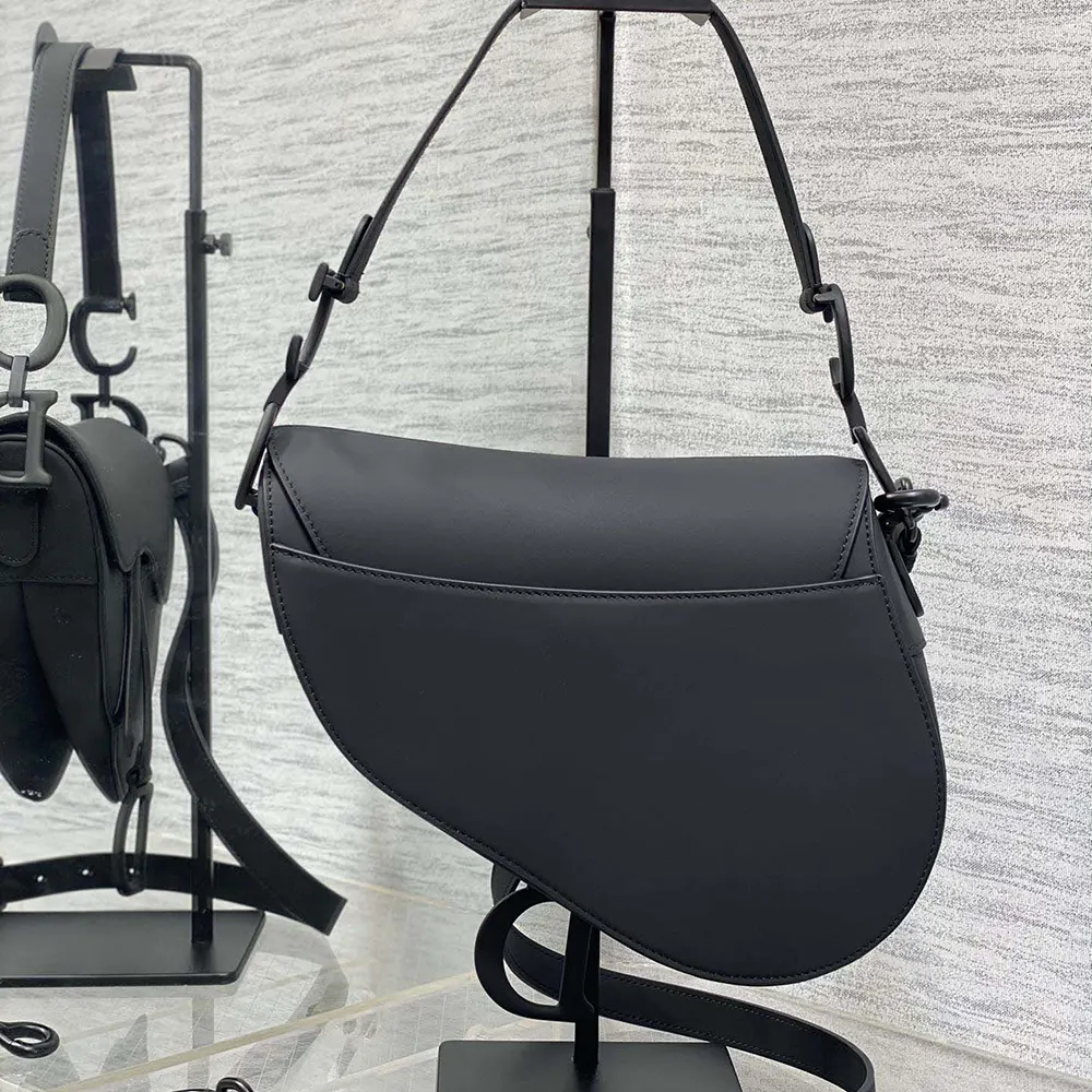 Side angle showing adjustable strap on Dior Women Saddle Bag Black