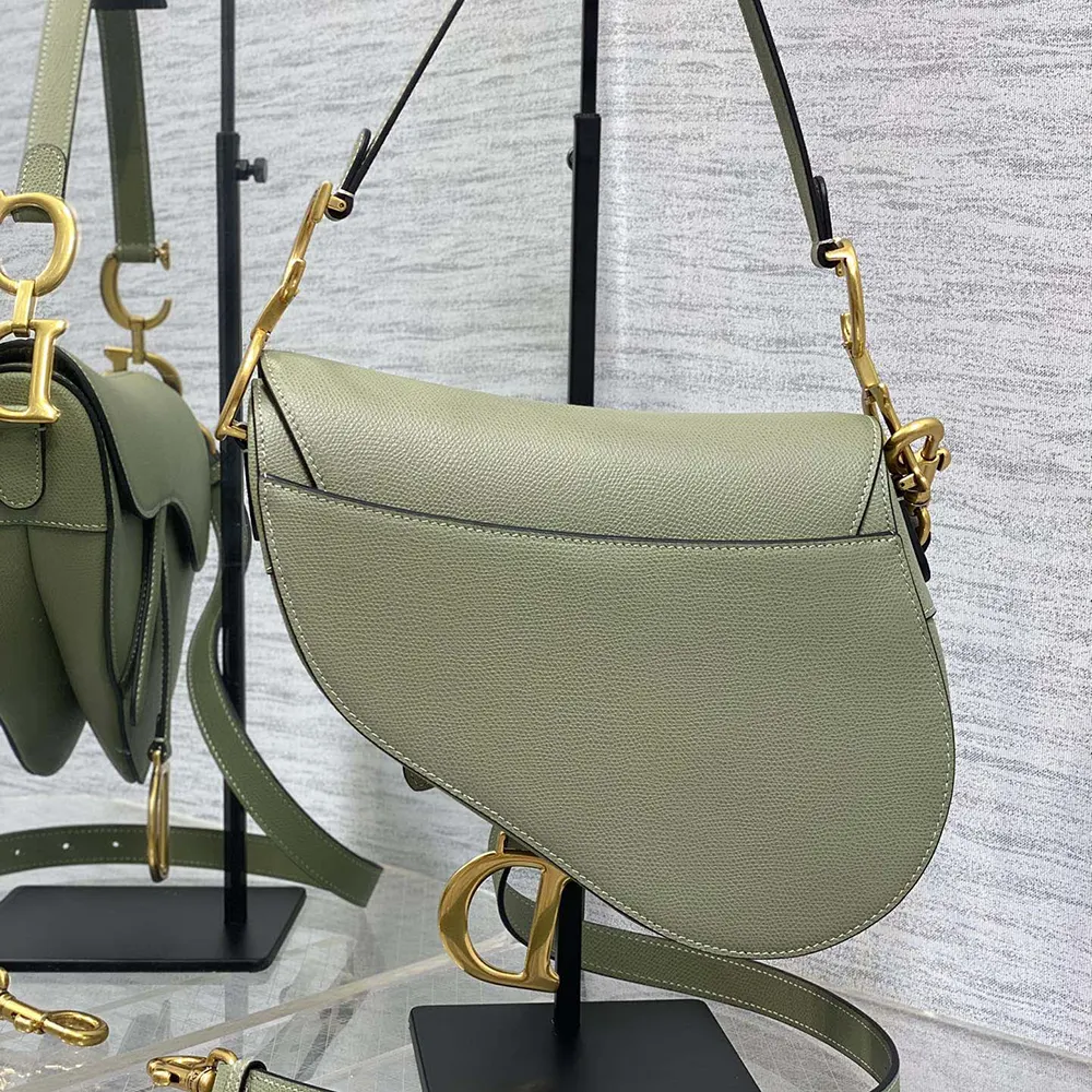 Side angle displaying silhouette of Dior Women Saddle Bag with Strap Cedar Green
