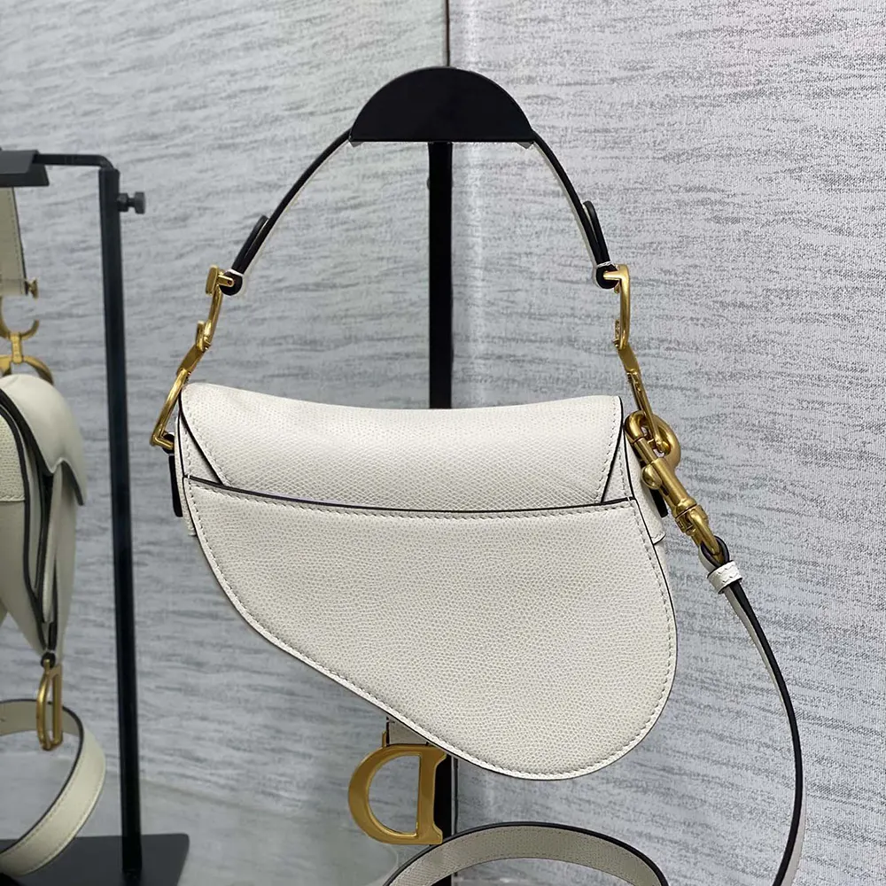 Side profile showing adjustable strap on Dior Women Saddle Bag with Strap Latte