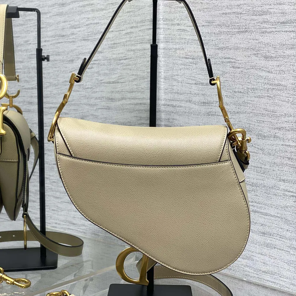 Side profile showing adjustable strap on Dior Women Saddle Bag with Strap