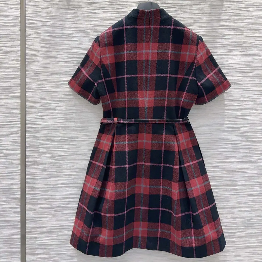 Side angle showcasing silhouette of Dior Women Short Belted Dress Pink Gray and White Check’n’Dior Virgin Wool