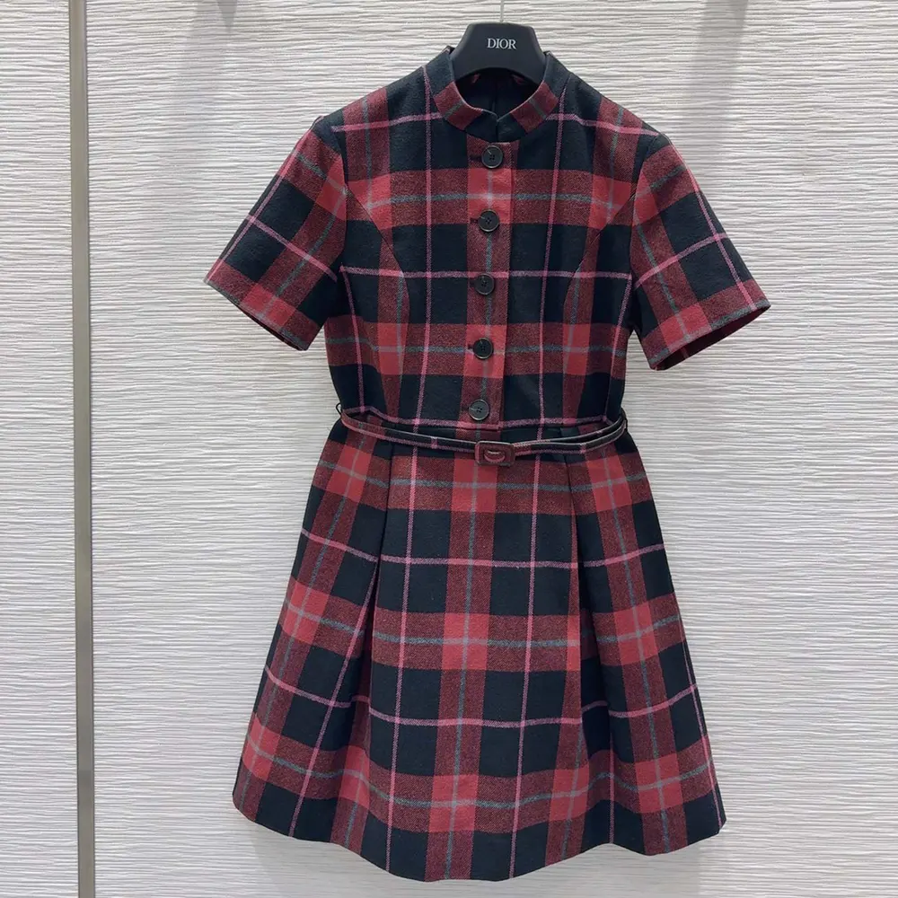 Close-up on belted waist and Check’n’Dior detail of the dress