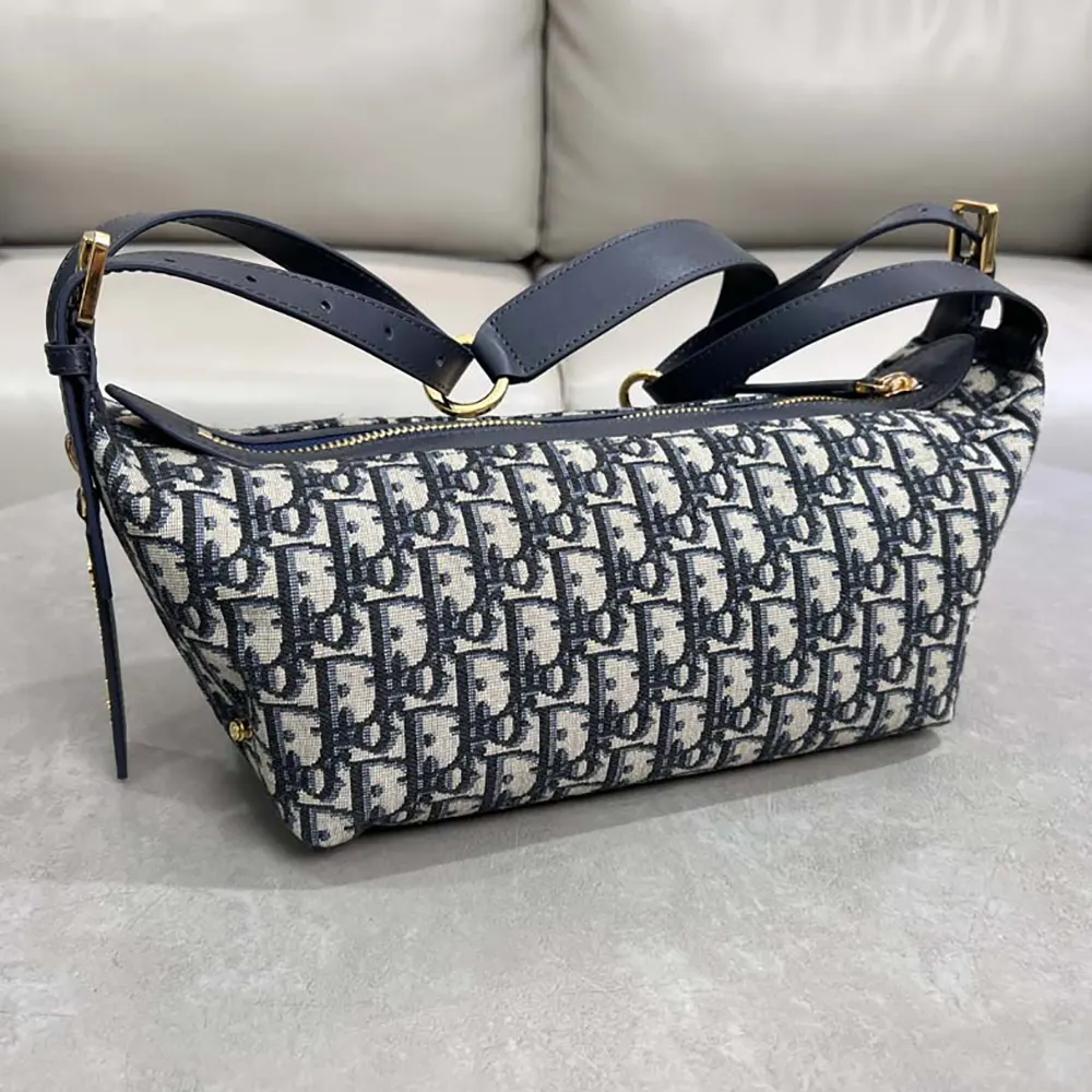 Side angle showing strap detail on Dior Women Small D-Journey Bag Blue