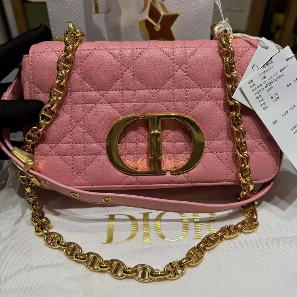 Side angle showing silhouette of Dior Women Small Dior Caro Bag Pink
