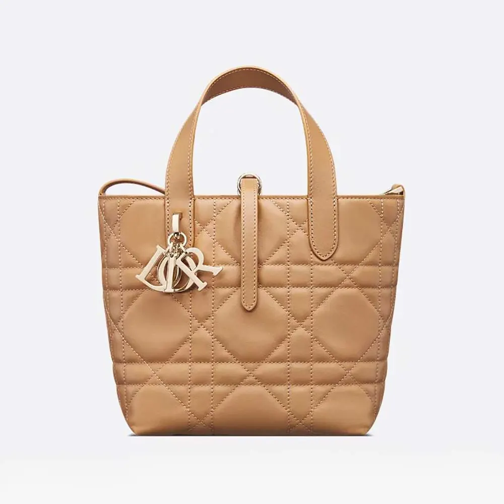 Front view of Dior Women Small Dior Toujours Vertical Tote Bag Medium Tan Macrocannage Calfskin