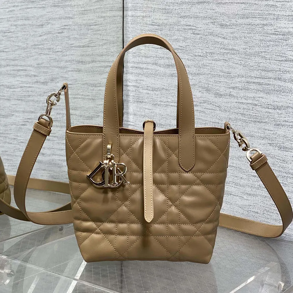 Close-up of signature macrocannage stitching on Dior Women Small Dior Toujours Vertical Tote Bag