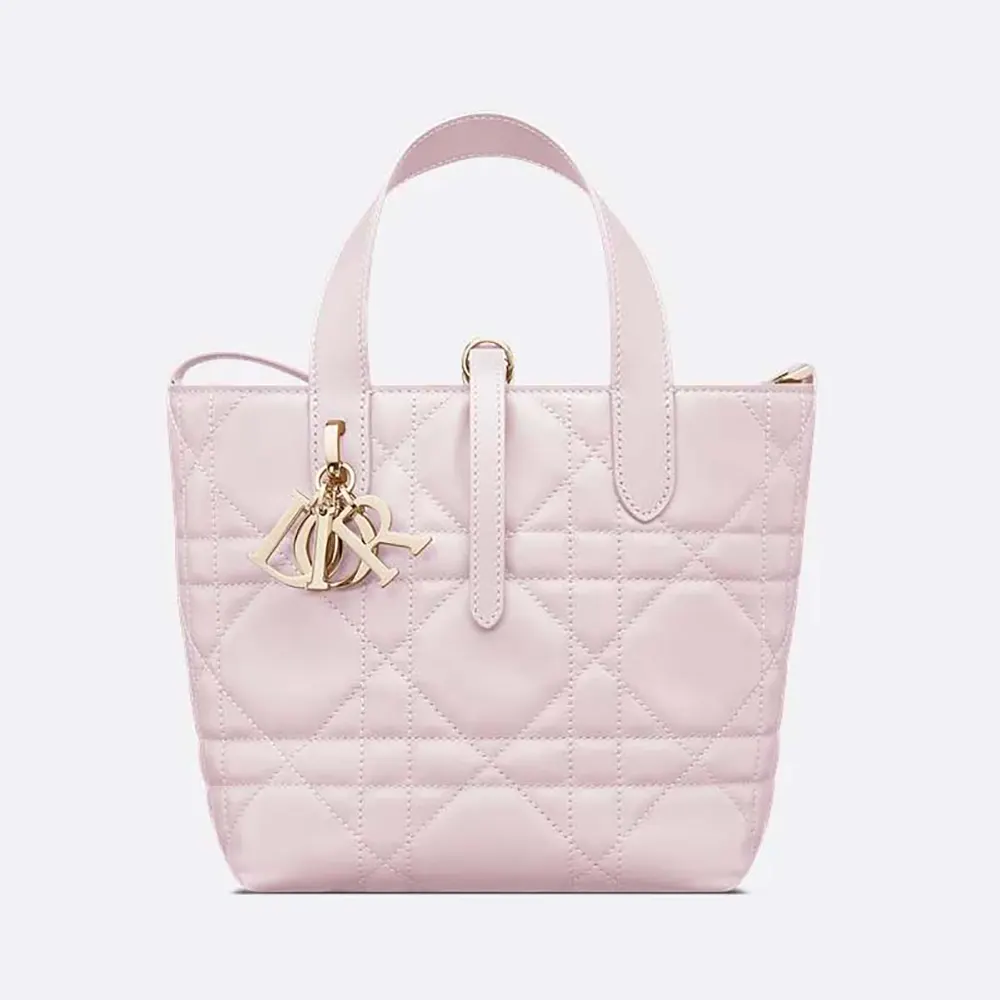 Front view of Dior Women Small Dior Toujours Vertical Tote Bag Pale Pink Macrocannage Calfskin