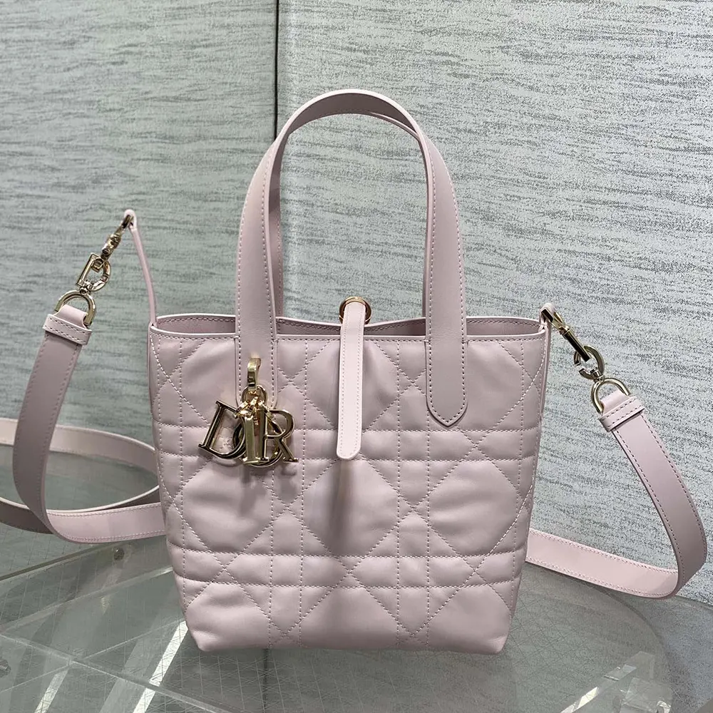 Close-up of Macrocannage stitching and silver closure on Dior Women Small Dior Toujours Tote