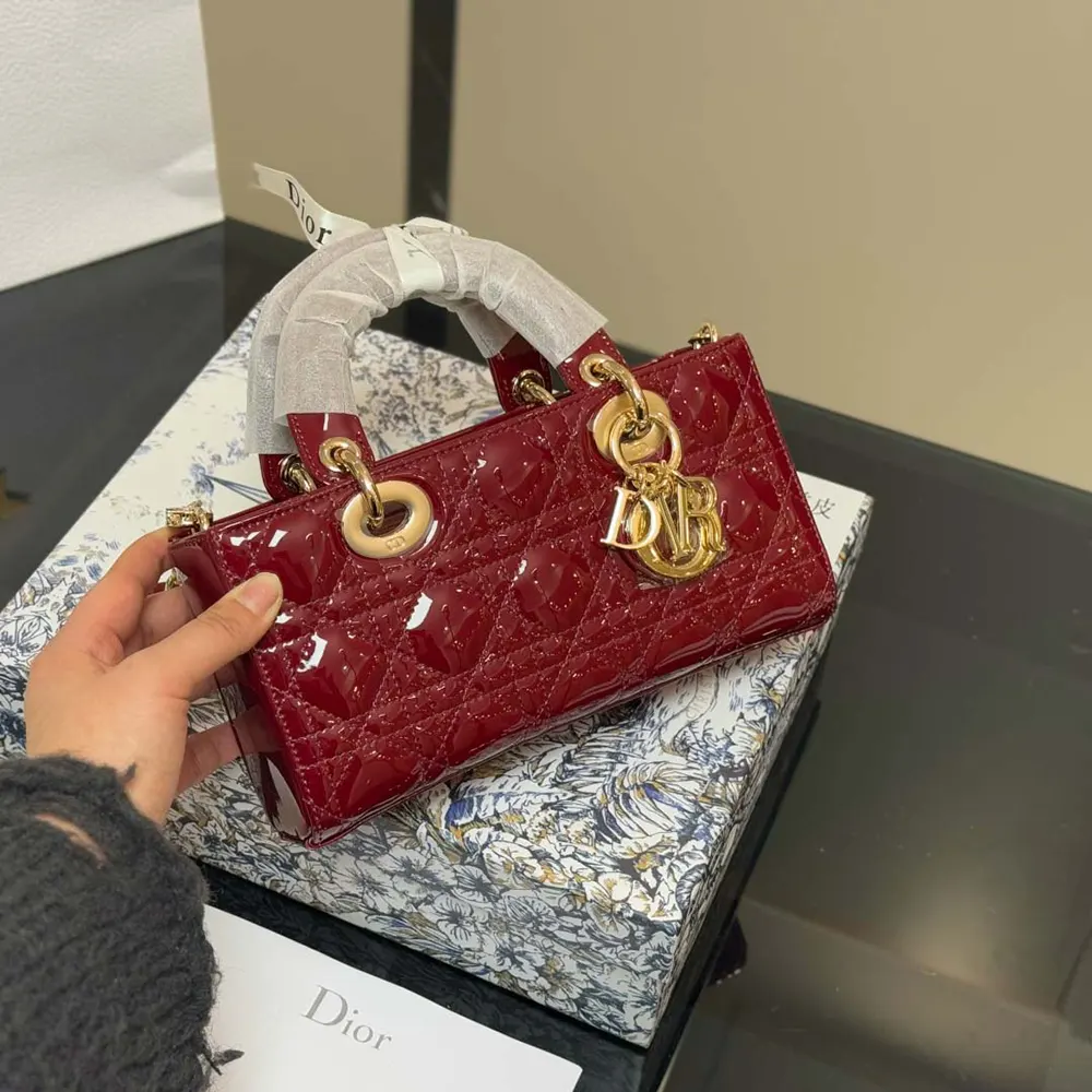 Side angle showing chain strap and magnetic closure on Dior Small Lady D-Joy Bag