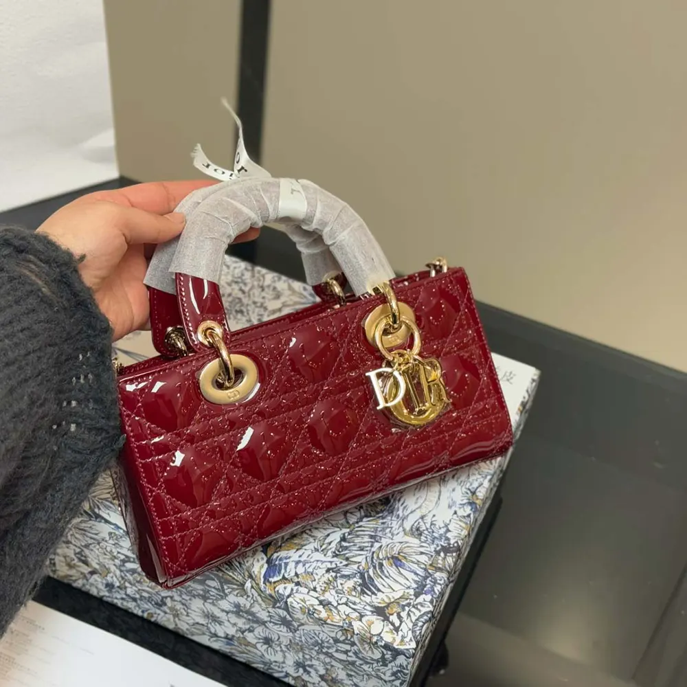 Close-up of silver Dior logo and Cannage stitching on D-Joy Bag