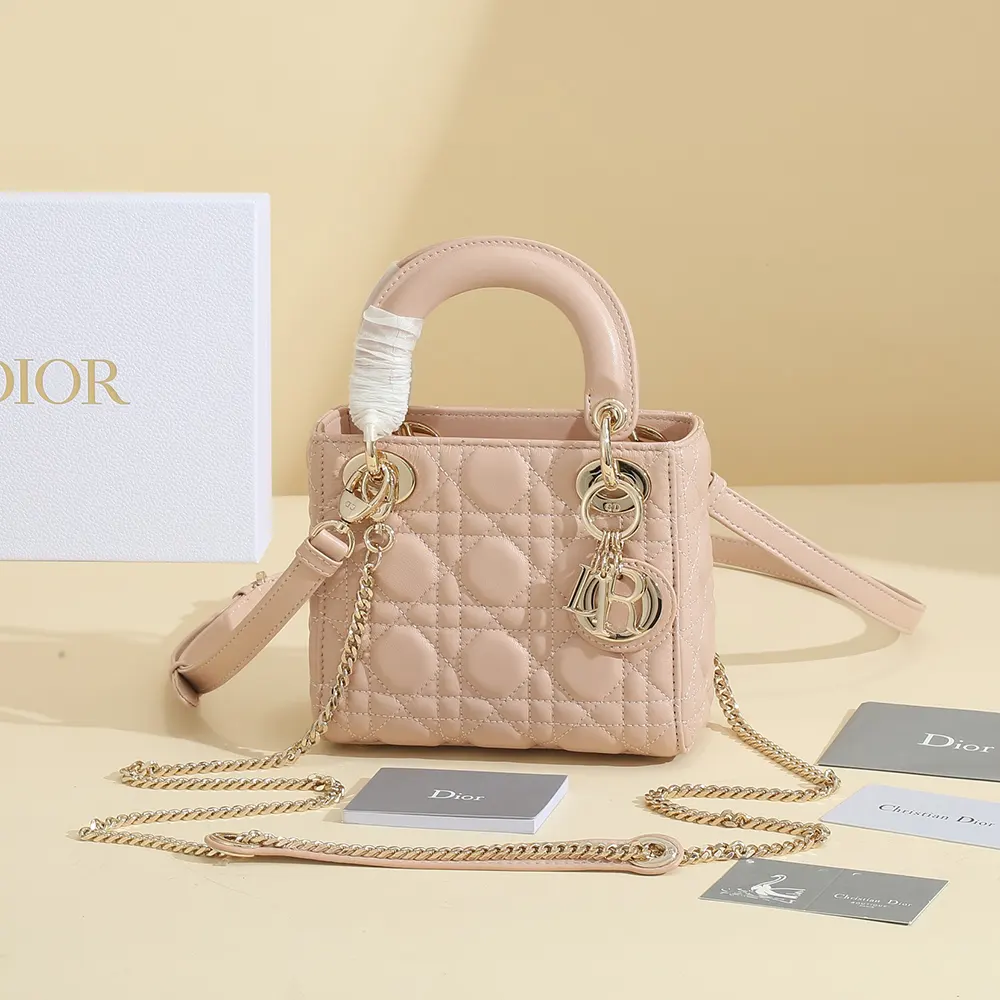 Close-up on gold-tone hardware and Cannage quilting of Dior Women Small Lady Dior My ABCDior Bag