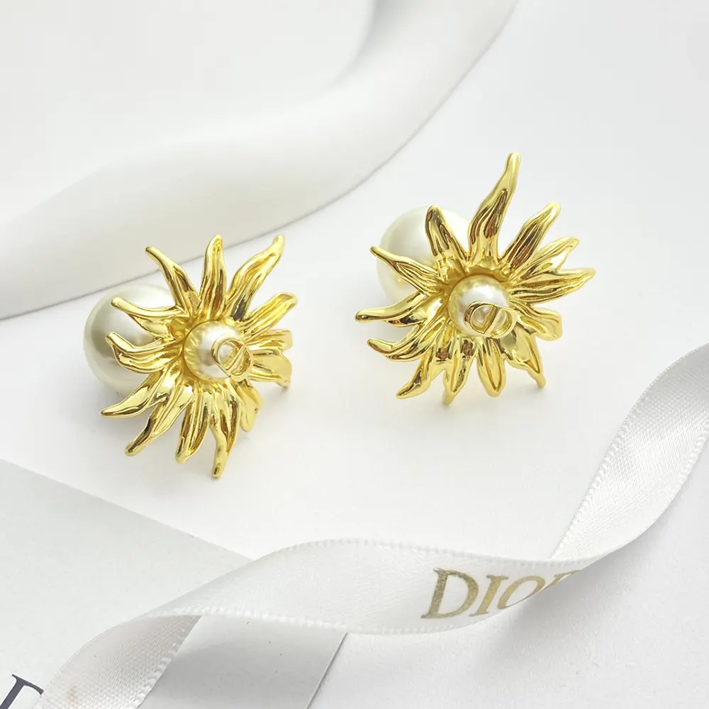 Detail of push-back closure on Dior Women Tribales Earrings gold finish