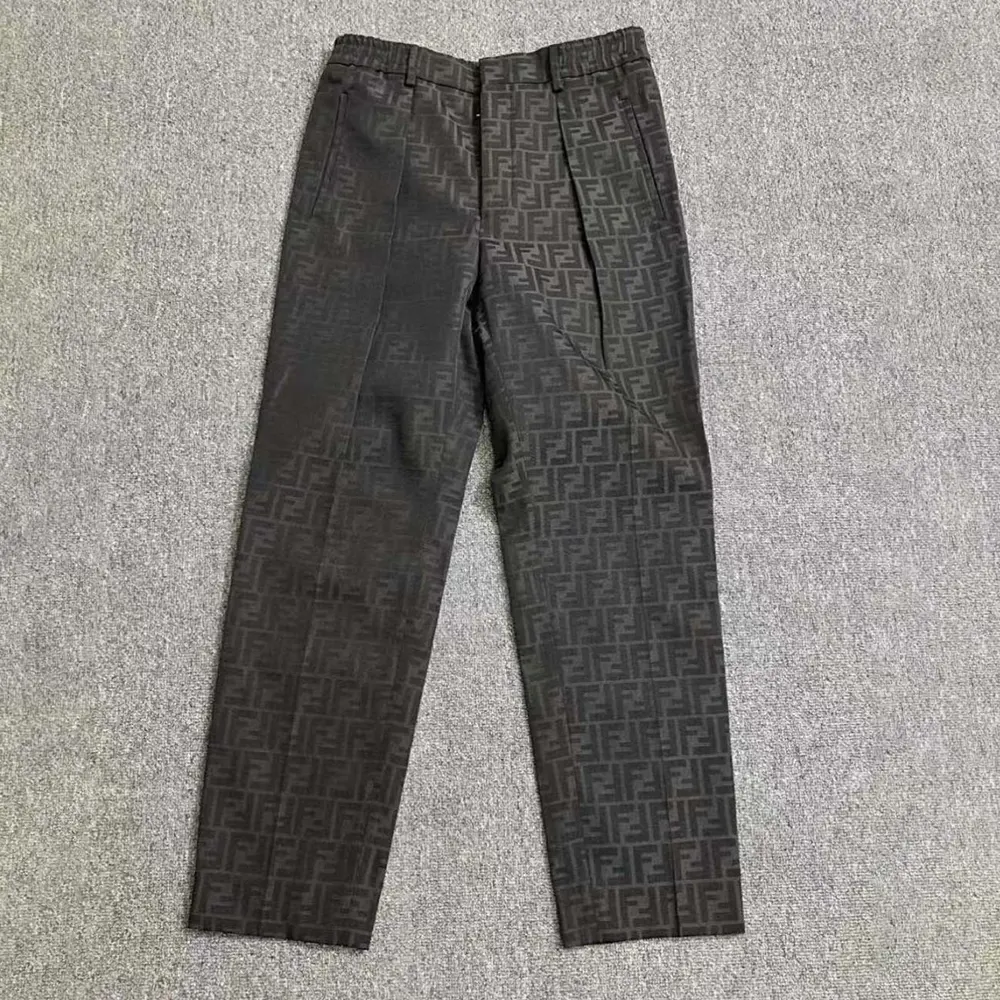 Close-up of Fendi Men Black Fabric Trousers zipper and logo hardware