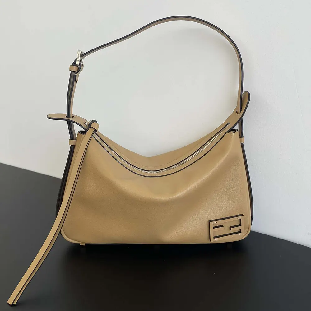 Close-up of gold hardware detail on Fendi Simply Fendi Beige Leather Bag