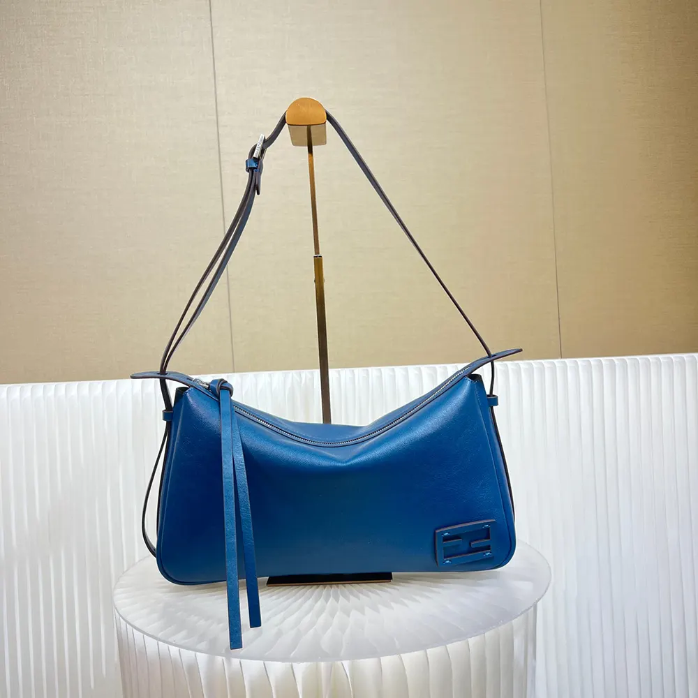 Close-up of silver hardware on Fendi Simply Fendi Medium Blue Bag
