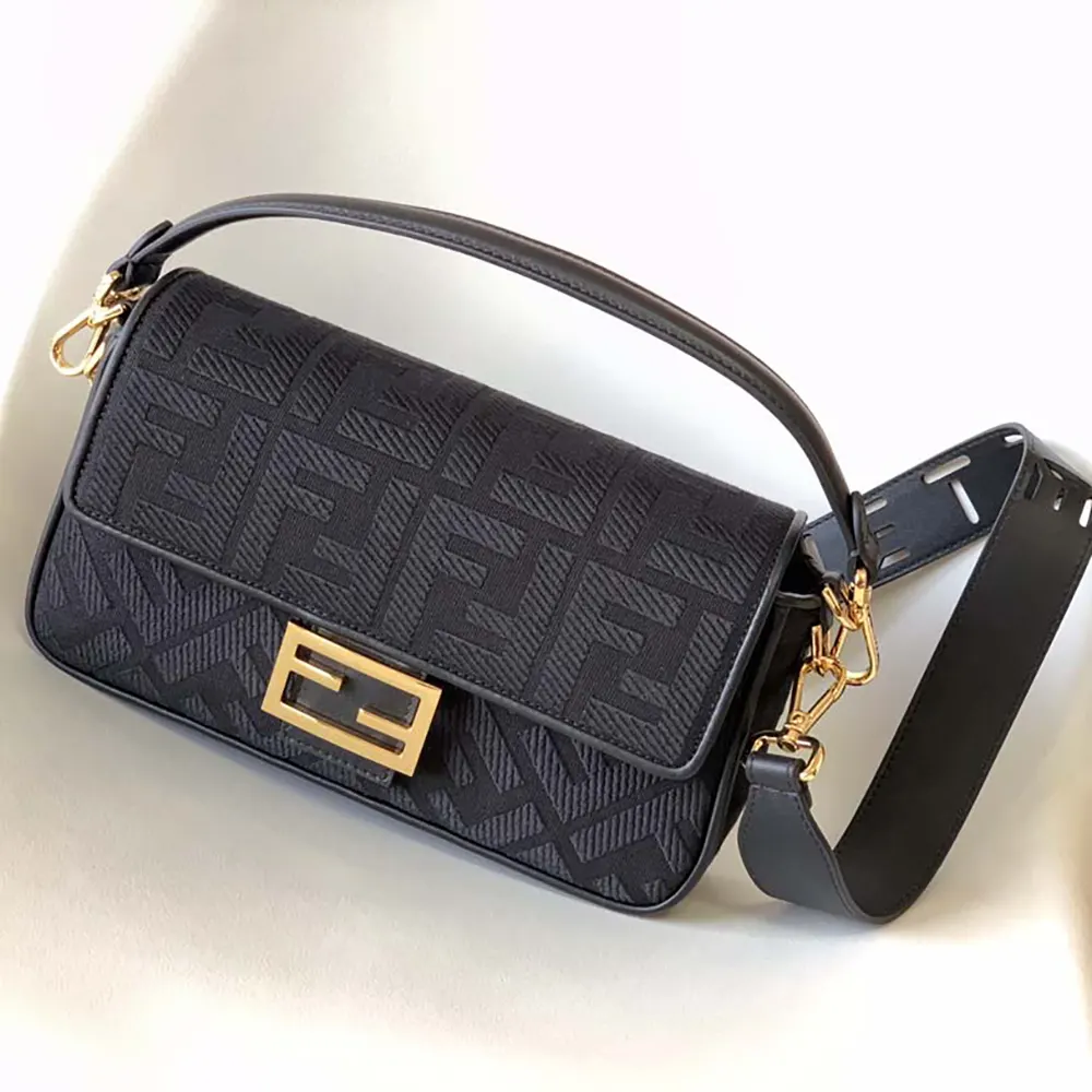 Close-up of FF embroidery detail on Fendi Women Baguette Black Denim Bag
