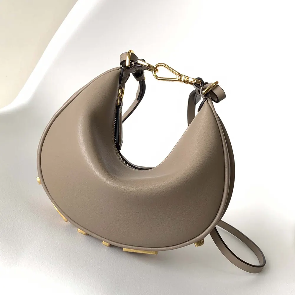 Side angle showing silver-tone hardware on Fendi mini bag