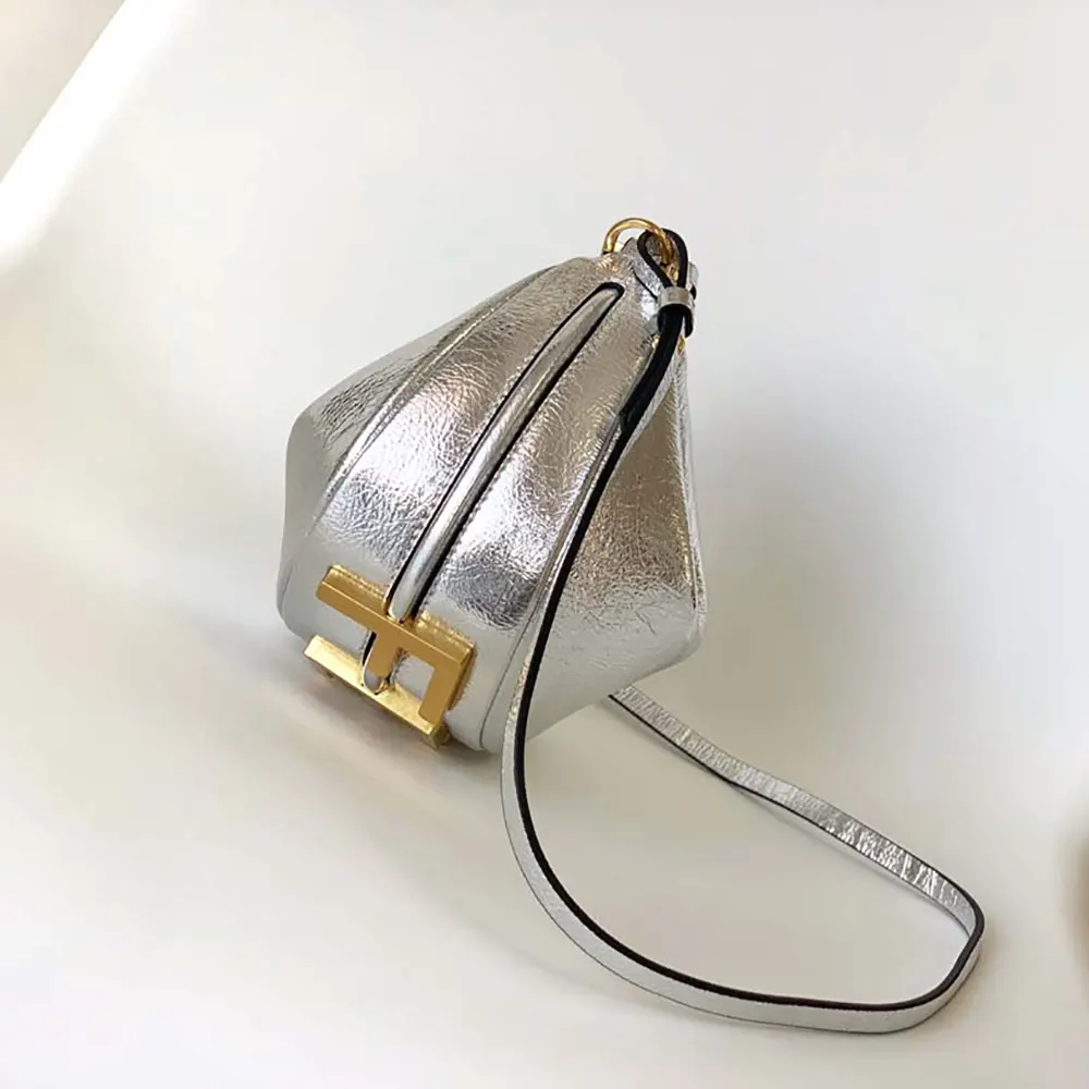 Side angle highlighting compact silhouette of Fendi Women Fendigraphy Mini Silver Leather Mini-bag