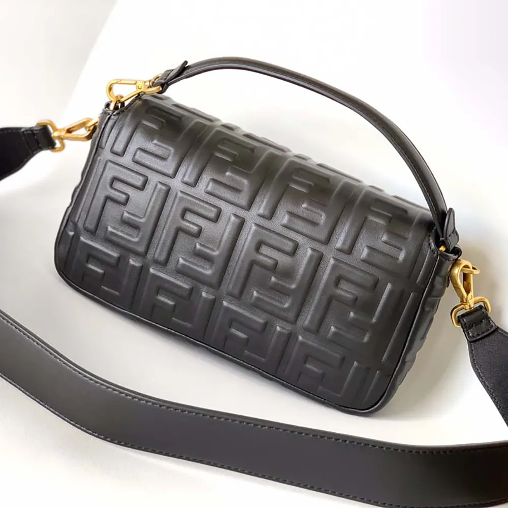 Side angle of Fendi Women Medium Baguette Black Leather Bag with shoulder strap