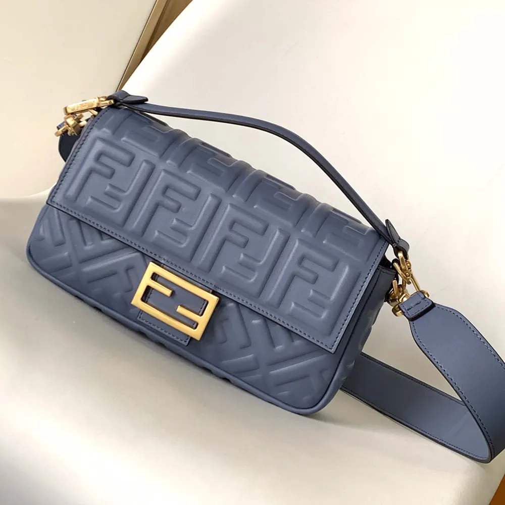 Close-up of gold-tone hardware on Fendi Women Medium Baguette Blue Leather Bag