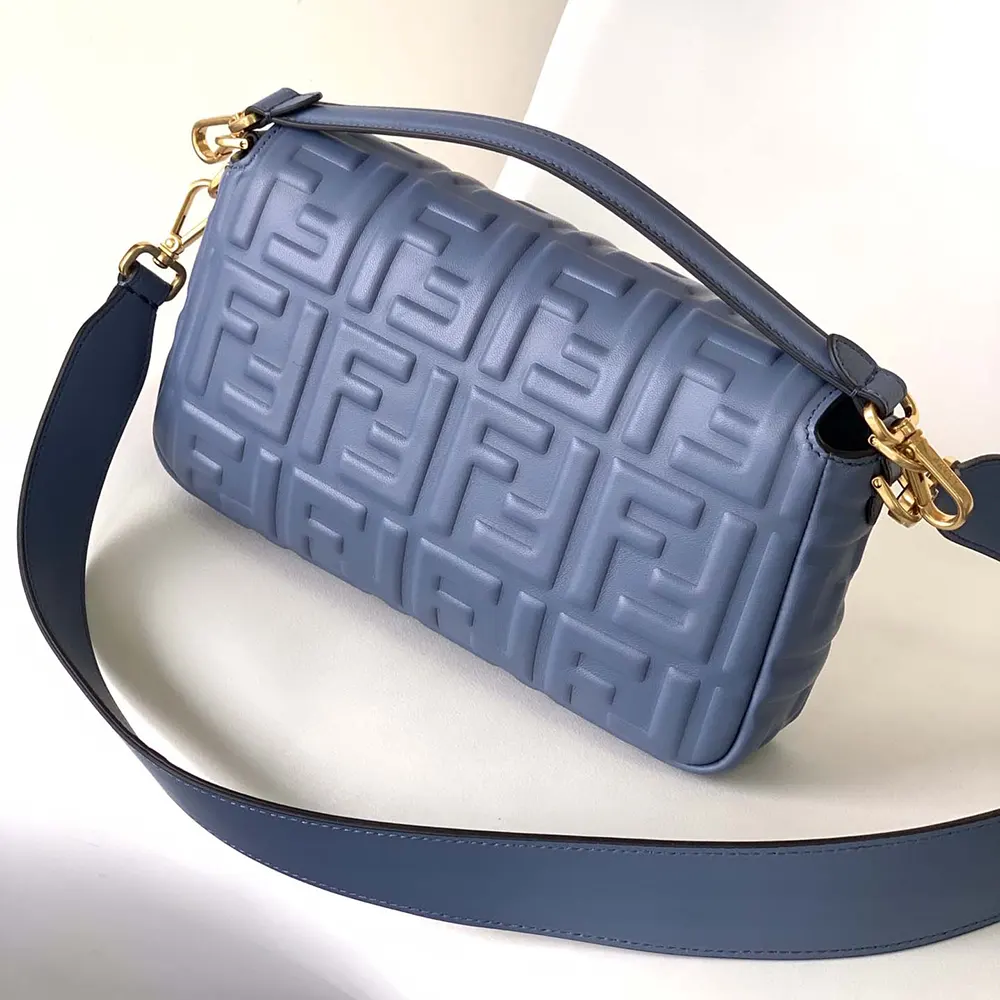 Side angle highlighting structured silhouette of Fendi Women Medium Baguette Blue Leather Bag