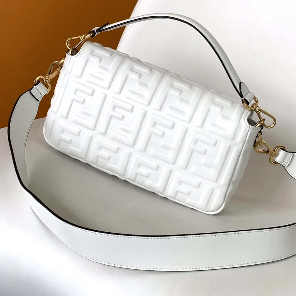 Side angle showing medium baguette silhouette of Fendi Women White Leather Bag