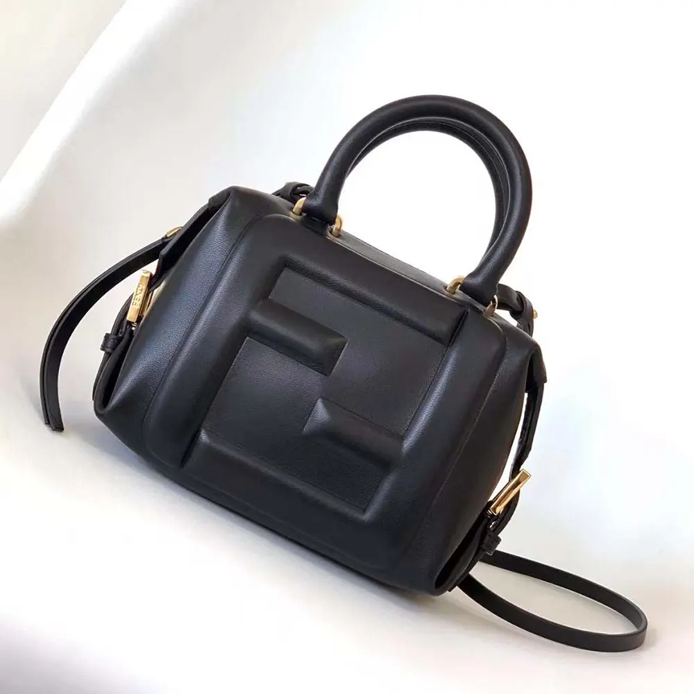 Close-up detail of gold-tone FF hardware on Fendi Women Nappa FF Mini Cube Bag-Black