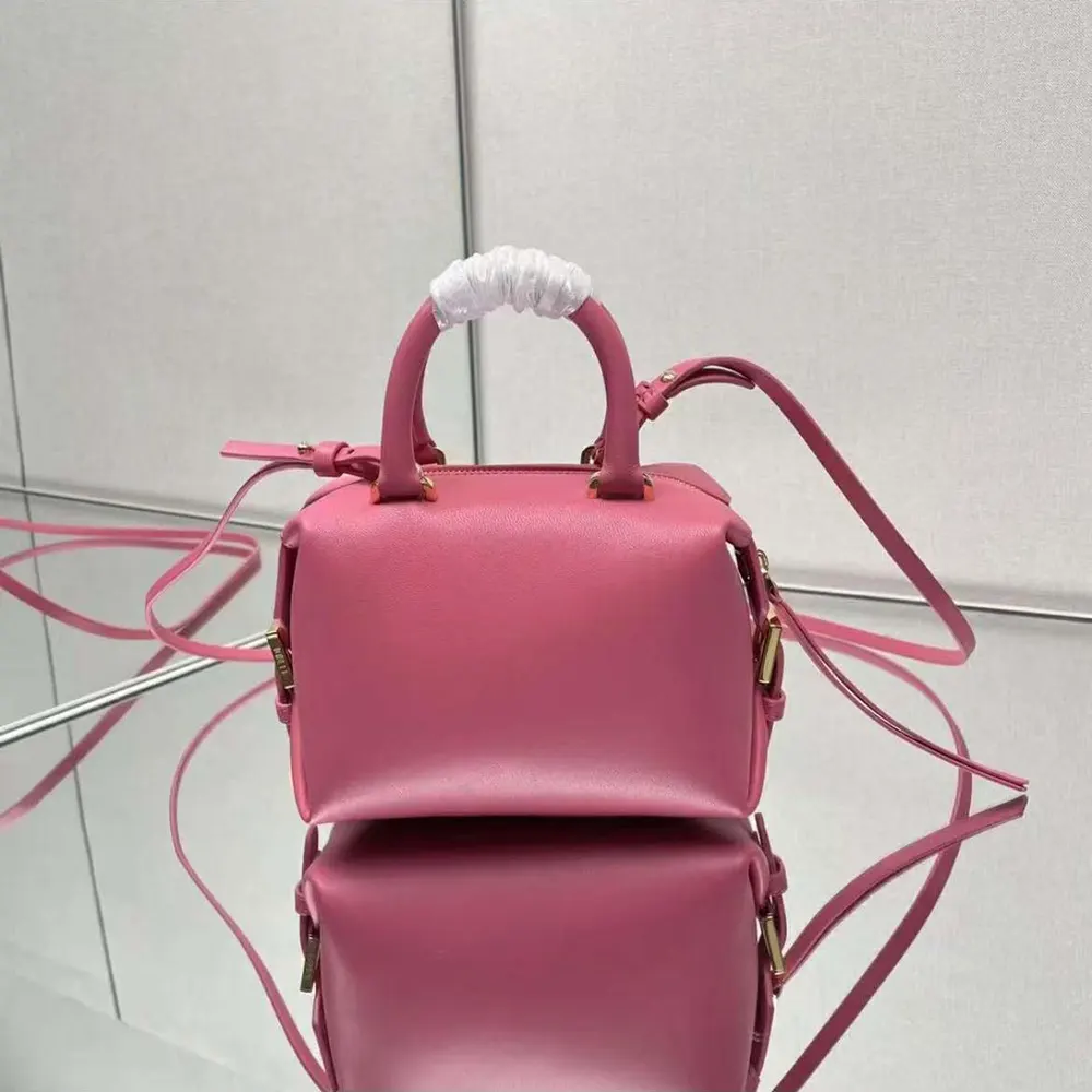 Side profile showing adjustable strap on Fendi Women Nappa FF Mini Cube Bag-Pink