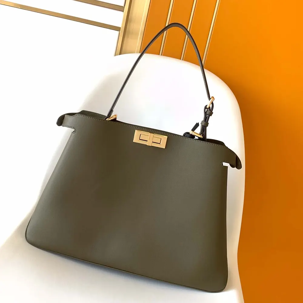 Close-up of gold hardware details on Fendi Women Peekaboo Soft Large Green Leather Bag