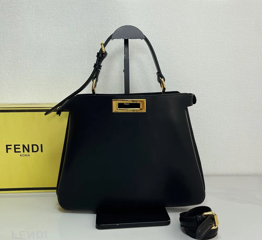 Side profile showing silhouette of Fendi Women Peekaboo Soft Medium Black Leather Bag